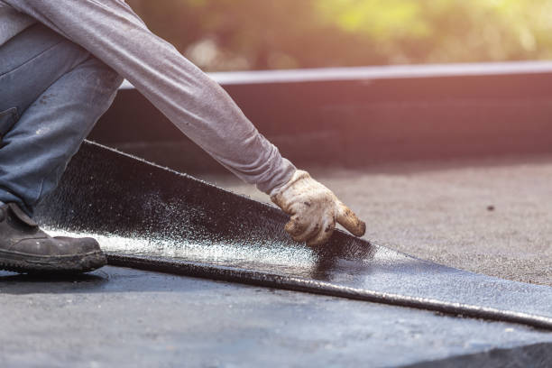 Professional Basement Waterproofing technician working in Caledonia, MN
